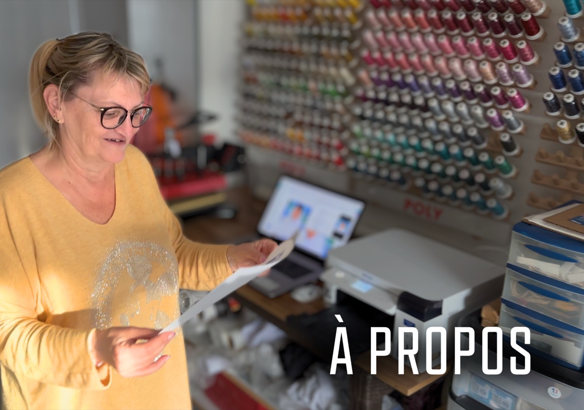 Magali dans son atelier, devant ses bobines de fil